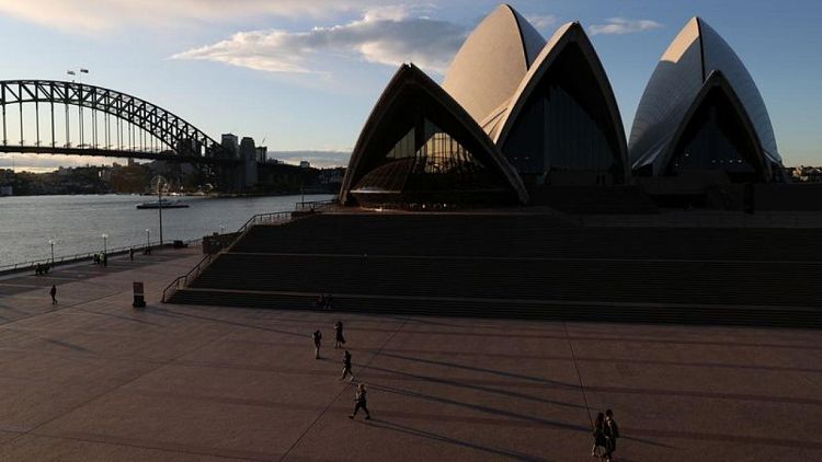 Analysis: Shut off from the world, Australia fosters red-hot growth at home