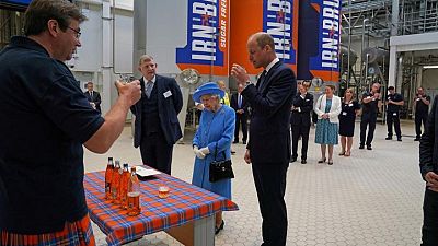 UK queen visits Irn-Bru factory, Prince William tastes the 'girders' UK queen visits Irn-Bru factory, Prince William tastes the 'girders'