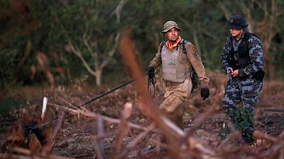 Brazilian police kill murder suspect after manhunt outside capital Brazilian police kill murder suspect after manhunt outside capital