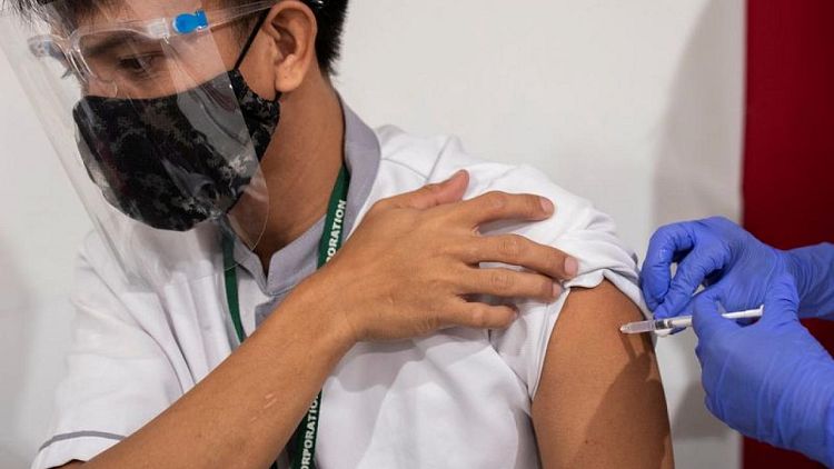 Philippines extends coronavirus curbs until mid-July