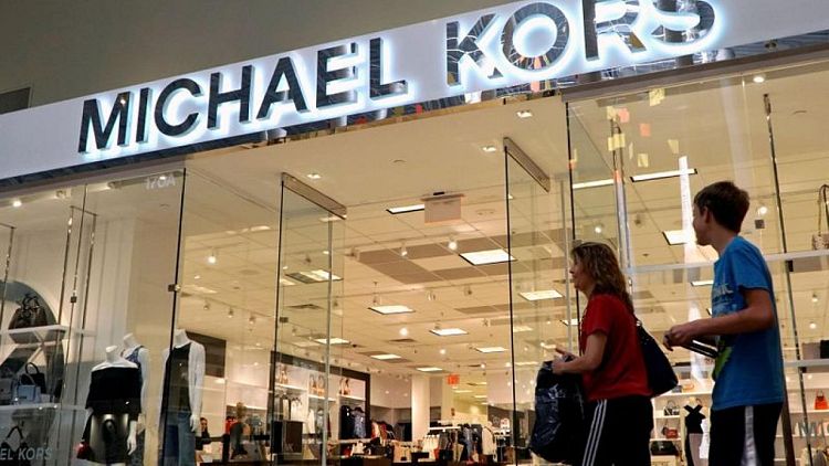 Michael Kors, Versace parent Capri beats revenue estimates