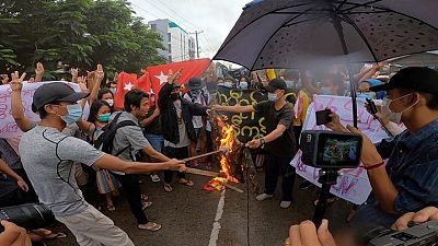 Myanmar protesters burn army uniform five months after coup Myanmar protesters burn army uniform five months after coup