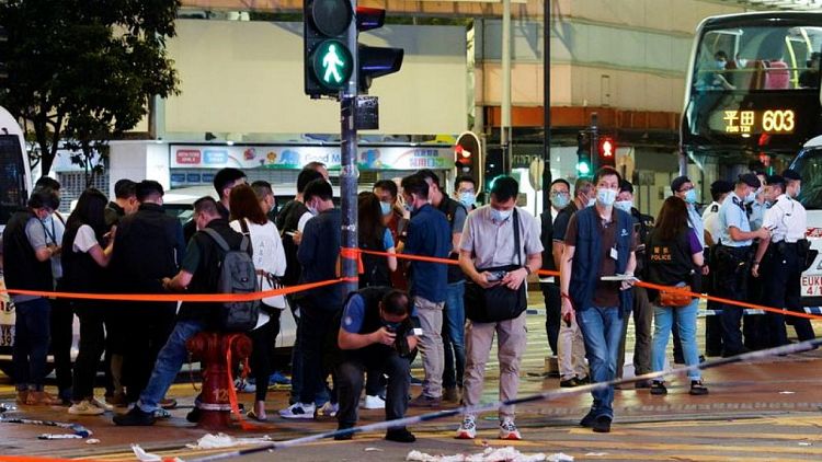 Hong Kong policeman was stabbed in "lone wolf" attack- security chief