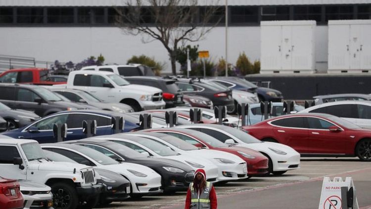 Tesla delivers record 201,250 vehicles in Q2, beats analysts' estimates