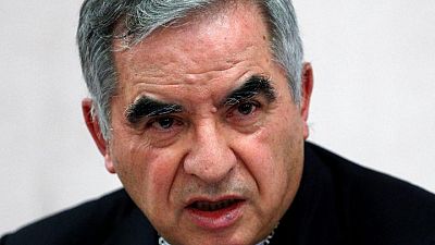 Vatican judge indicts 10, including a cardinal, for alleged financial crimes Vatican judge indicts 10, including a cardinal, for alleged financial crimes