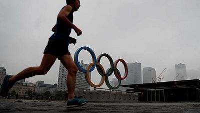 Tokyo goes to the polls as pandemic-shadowed Olympics loom Tokyo goes to the polls as pandemic-shadowed Olympics loom