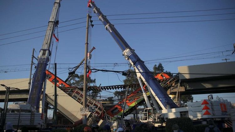 Mexico City boosts funds for families of train collapse victims