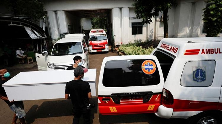 Indonesia reports record daily number of COVID-19 cases and deaths