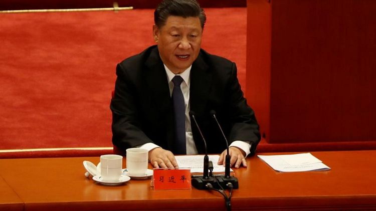 China's Xi tells Macron, Merkel he hopes to expand cooperation with Europe