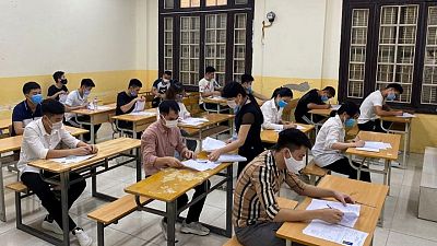 Vietnam students turn out for exams under coronavirus cloud Vietnam students turn out for exams under coronavirus cloud