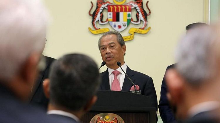 Key party in Malaysia alliance withdraws support from PM Muhyiddin