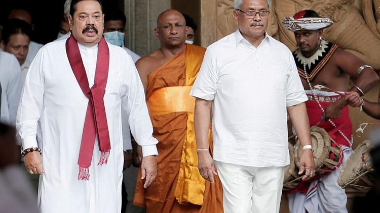 Sri Lanka's Rajapaksa family tightens grip with ministerial picks