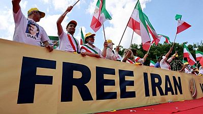Iranian exiles protest, demand prosecution of president-elect Iranian exiles protest, demand prosecution of president-elect