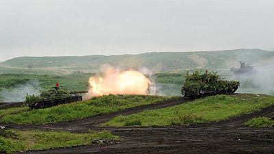 Japan warns of crisis over Taiwan, growing risks from U.S.-China rivalry Japan warns of crisis over Taiwan, growing risks from U.S.-China rivalry