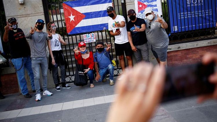 U.S warns Cubans away from sea crossings amid protests, but most cross on land