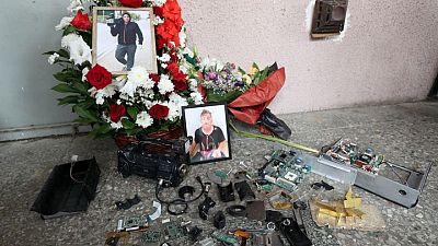 Four Georgian TV stations go off air in protest over journalist's death Four Georgian TV stations go off air in protest over journalist's death