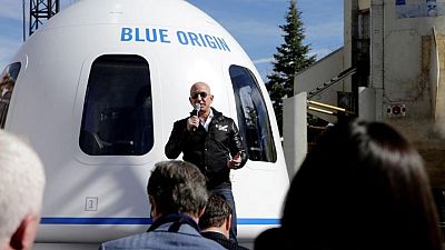 Bezos' Blue Origin to make history with unpiloted civilian space flight Bezos' Blue Origin to make history with unpiloted civilian space flight