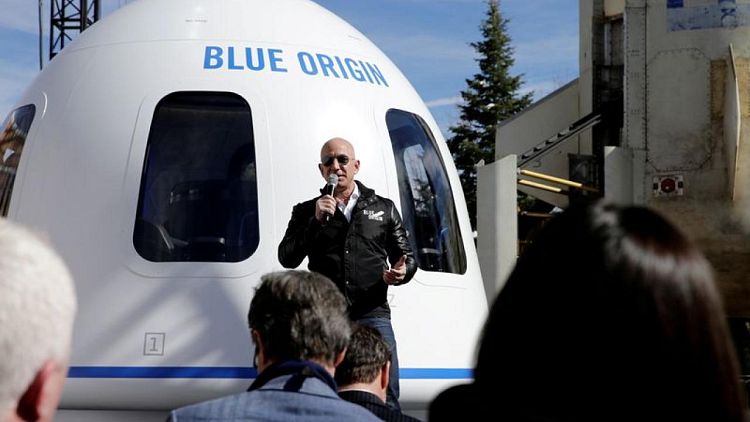 Bezos' Blue Origin to make history with unpiloted civilian space flight