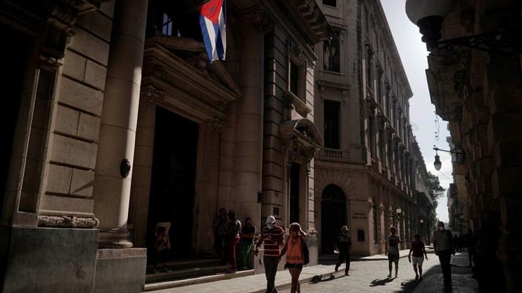 White House may ease ban on remittances as part of Cuba review -sources