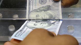 Dollar regroups after Powell push