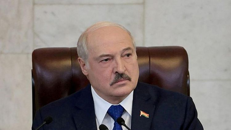 Belarus police raid homes and offices of journalists, rights activists