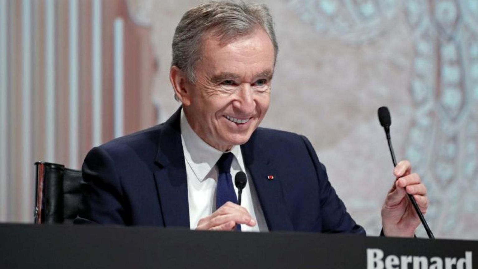 Luxury billionaire Arnault sells out of retailer Carrefour