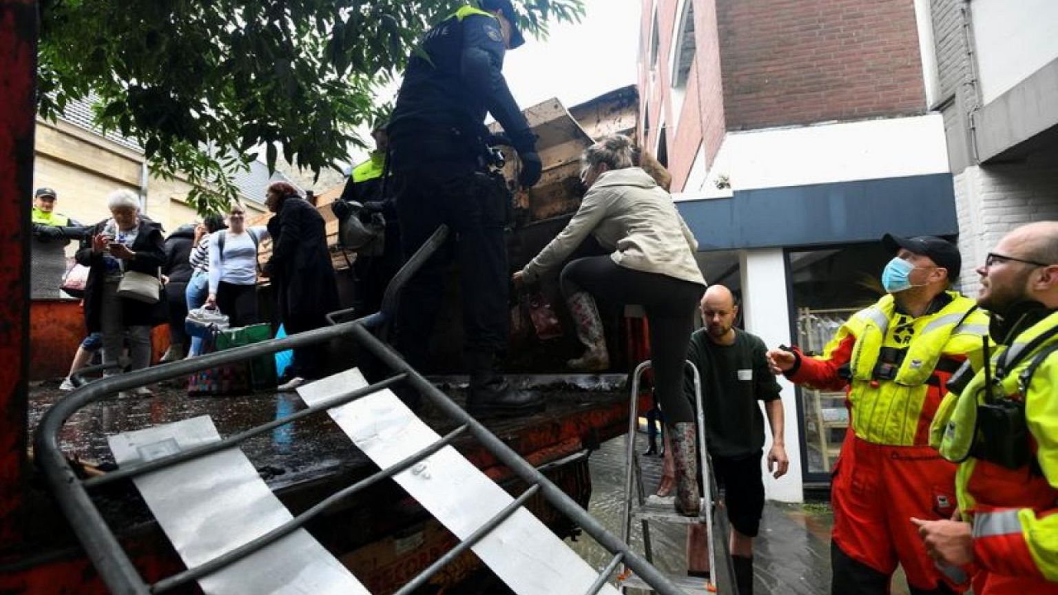 Hundreds flee as flood waters breach Dutch defences