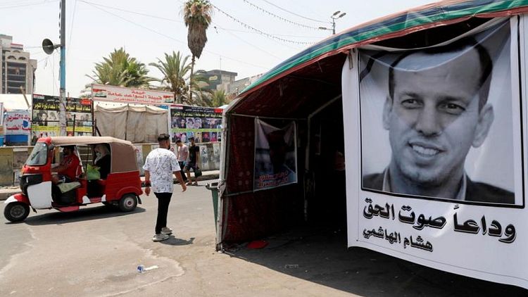 Iraqi TV shows suspect confess to murdering prominent advisor