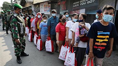 Indonesia considers extending restrictions on movement as COVID-19 cases climb Indonesia considers extending restrictions on movement as COVID-19 cases climb