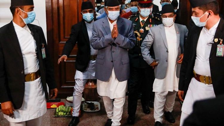 Nepal's new PM wins confidence vote amid coronavirus crisis