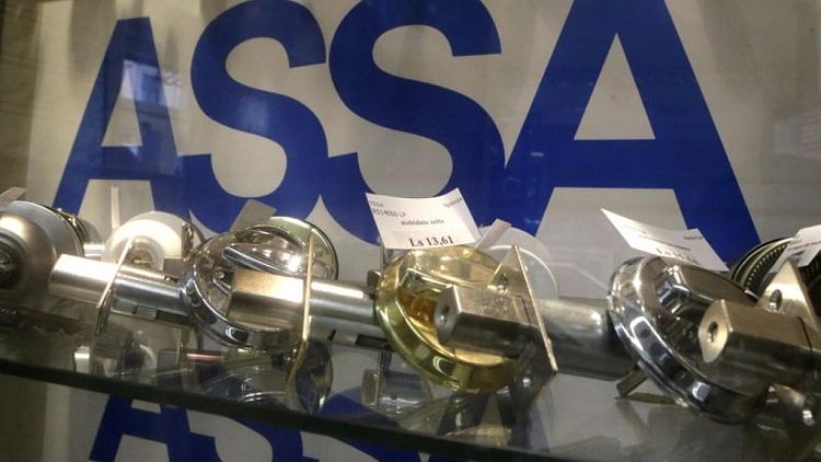 Lockmaker Assa Abloy's profits soar, but travel-related sales lag
