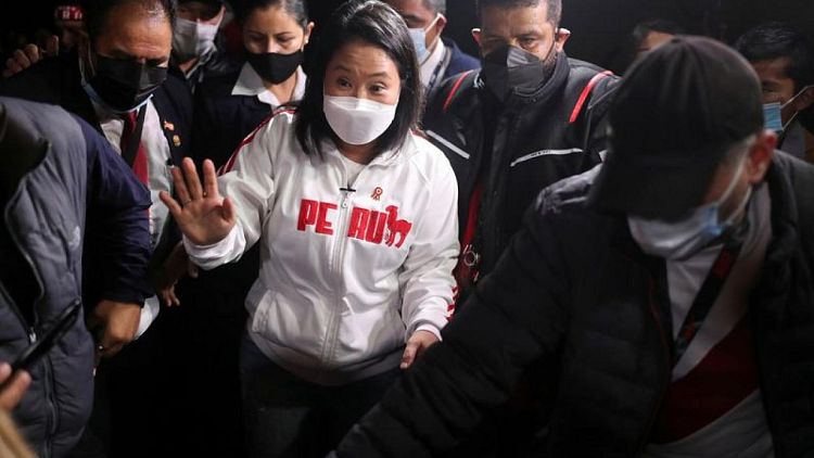 Peru's Fujimori admits defeat in presidential election, lashes out at socialist rival
