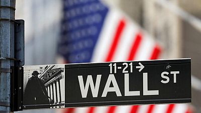 Wall street stocks soar, U.S. yields fall after Powell's dovish speech on bond tapering