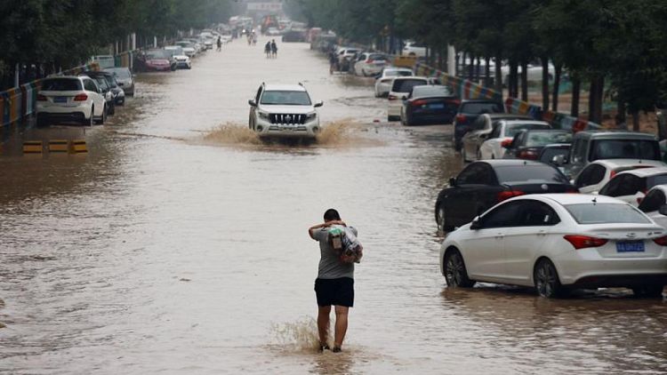 Disaster recovery in rain-lashed central China shifts up a gear