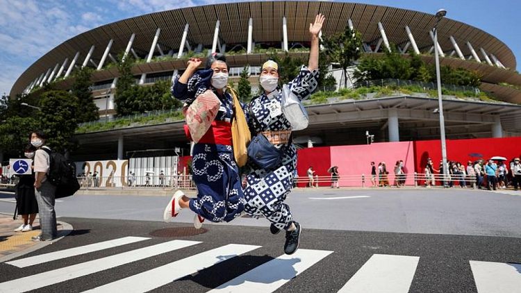 Olympics-Slimmed-down ceremony to open pandemic-hit Tokyo Games