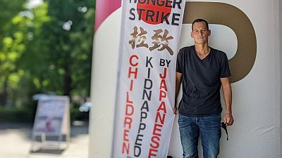 Olympics-Frenchman seeks Macron's help over 'abduction' of his children in Japan Olympics-Frenchman seeks Macron's help over 'abduction' of his children in Japan
