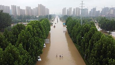 Many migrant workers stranded in Chinese cities hit by floods Many migrant workers stranded in Chinese cities hit by floods