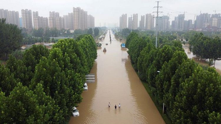 Many migrant workers stranded in Chinese cities hit by floods