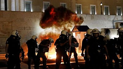 Greek police clash with protesters in rally against mandatory vaccinations Greek police clash with protesters in rally against mandatory vaccinations