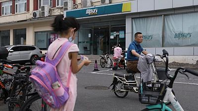 Chinese parents fret after government bans for-profit tutoring firms Chinese parents fret after government bans for-profit tutoring firms