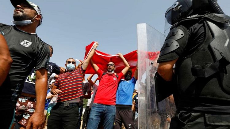 Factbox-Reactions to Tunisia's democratic crisis