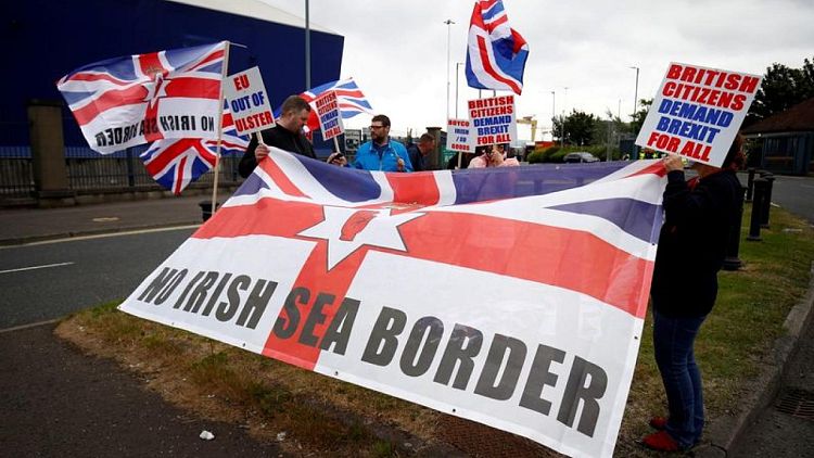 Britain warns of 'cold mistrust' if EU does not move on Northern Ireland trade