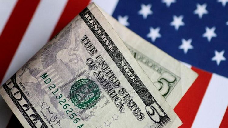 الدولار متمسك بمكاسبه قبل نشر محضر اجتماع المركزي الأمريكي