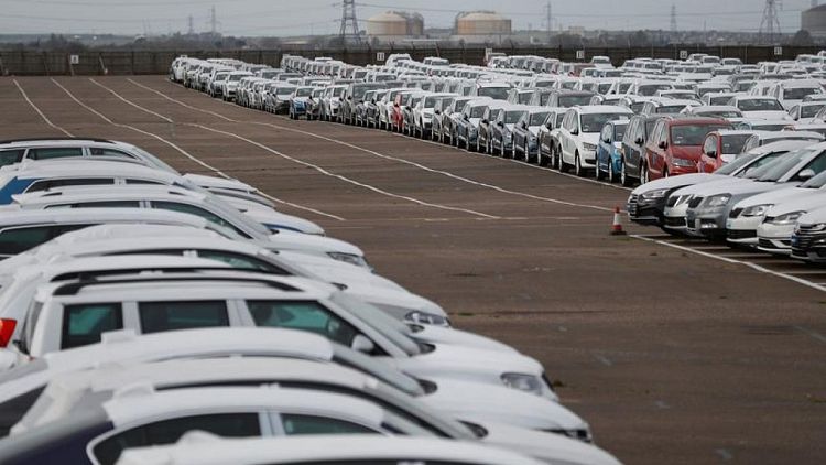 UK car output up a third after slump but sector warns of chip shortage
