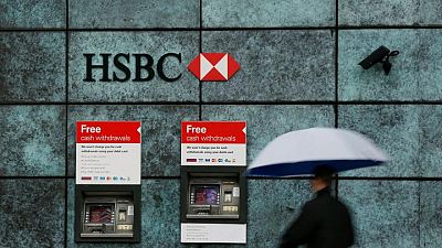 HSBC doubles profit, hints at share buybacks as bad loan fears ease