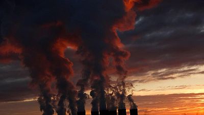 Britain triggers cost curb measure in CO2 scheme in December