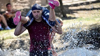 Hungarians grab their partners in nation's wife-carrying contest