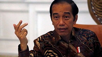 Indonesian president says restrictions needed to stem COVID surge outside most populous islands