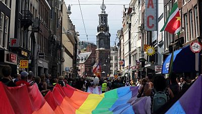 Amsterdam substitutes 'Pride Walk' for canal parade in 25th anniversary of Gay Pride