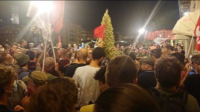 Corteo nelle strade di Firenze aperto dalle bandiere dell'Anpi Corteo nelle strade di Firenze aperto dalle bandiere dell'Anpi